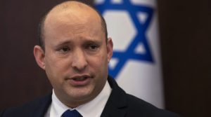 Perdana Menteri Israel Naftali Bennett berbicara selama pertemuan kabinet mingguan di kantornya di al-Quds, pada 5 September 2021.